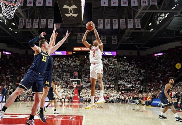 Jon Teske (15), Franz Wagner (21), Eli Brooks (55), and David DeJulius (0)