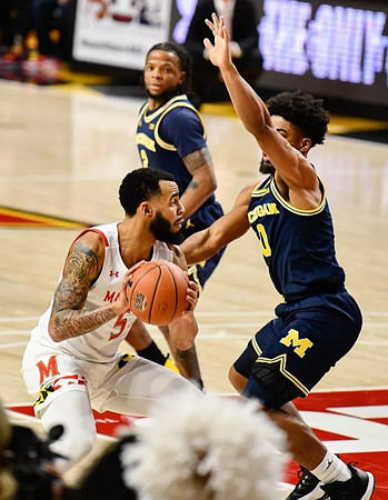 Zavier Simpson (3) and David DeJulius (0)