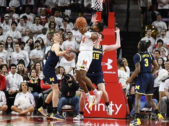 Franz Wagner (21), Jon Teske (15), and Zavier Simpson (3)