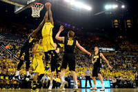 Glenn Robinson III (1) and Jordan Morgan (52)