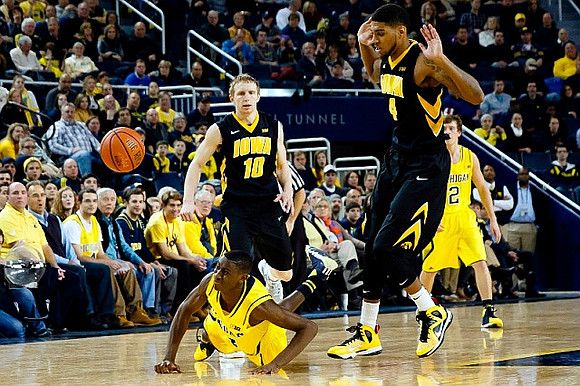 Caris LeVert (23) and Spike Albrecht (2)
