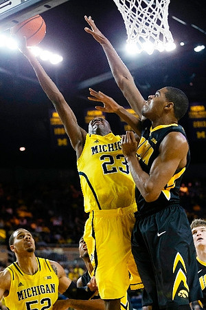 Jordan Morgan (52) and Caris LeVert (23)