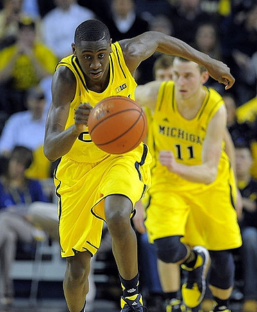 Caris LeVert (23) and Nik Stauskas (11)
