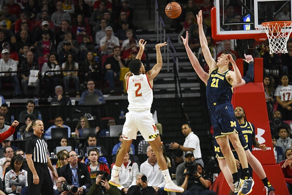 Franz Wagner (21) and Zavier Simpson (3)