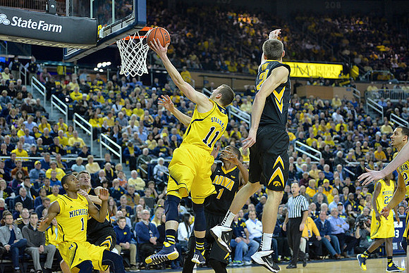 Glenn Robinson III (1), Nik Stauskas (11), Caris LeVert (23), and Jordan Morgan (52)