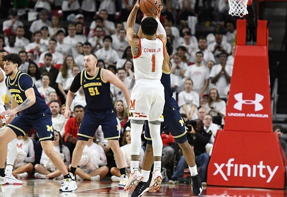 Brandon Johns Jr. (23), Austin Davis (51), and David DeJulius (0)