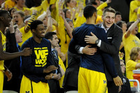 Caris LeVert (23), Derrick Walton Jr. (10), Jon Horford (15), and Mitch McGary (4)