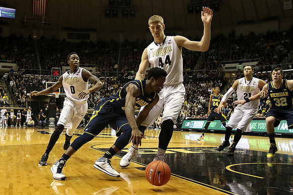 Derrick Walton Jr. (10) and Ricky Doyle (32)