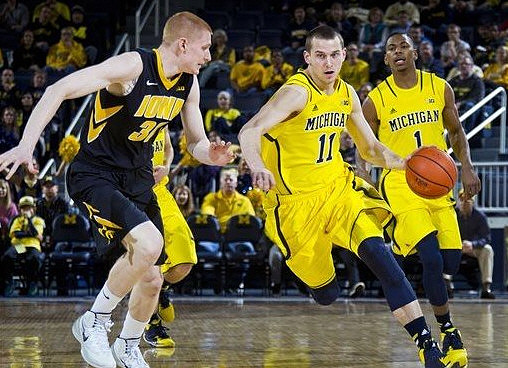 Nik Stauskas (11) and Glenn Robinson III (1)