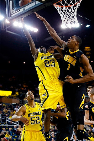 Jordan Morgan (52) and Caris LeVert (23)