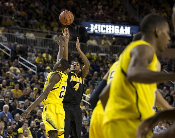 Caris LeVert (23) and Glenn Robinson III (1)