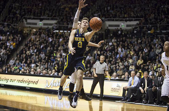 Spike Albrecht (2) and John Beilein