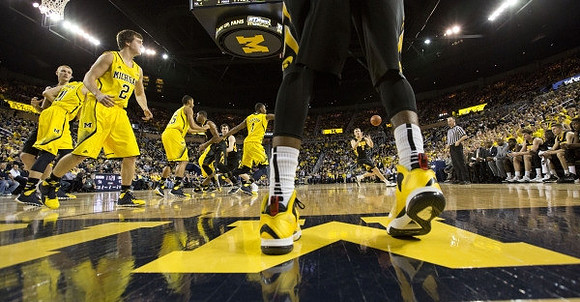 Spike Albrecht (2), Nik Stauskas (11), Jon Horford (15), and Glenn Robinson III (1)