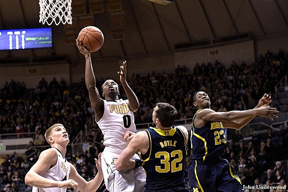 Ricky Doyle (32) and Caris LeVert (23)