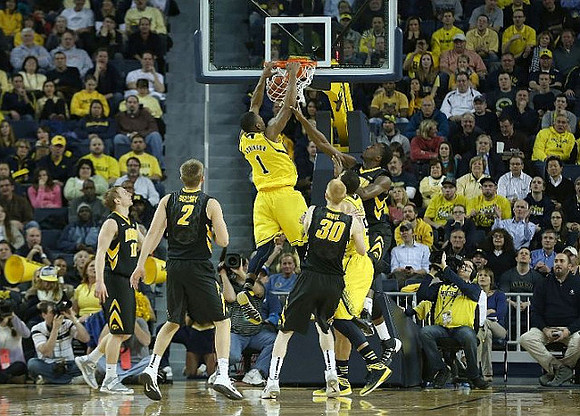 Glenn Robinson III (1) and Jordan Morgan (52)
