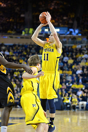 Spike Albrecht (2) and Nik Stauskas (11)