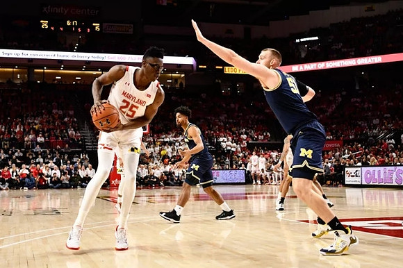 David DeJulius (0) and Austin Davis (51)