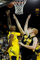 Glenn Robinson III (1) and Jordan Morgan (52)