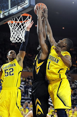 Jordan Morgan (52) and Glenn Robinson III (1)