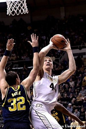 Ricky Doyle (32) and Caris LeVert (23)