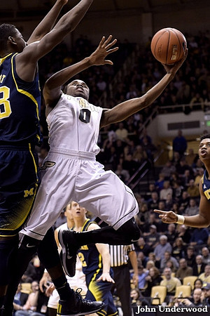 Caris LeVert (23), Spike Albrecht (2), and Kameron Chatman (3)
