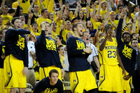 Sean Lonergan (20), Andrew Dakich (5), Mark Donnal (34), Max Bielfeldt (44), Caris LeVert (23), and Derrick Walton Jr. (10)