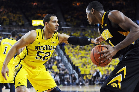 Jordan Morgan (52) and Glenn Robinson III (1)