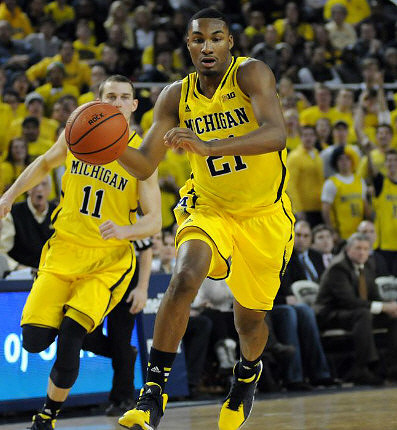 Nik Stauskas (11) and Zak Irvin (21)