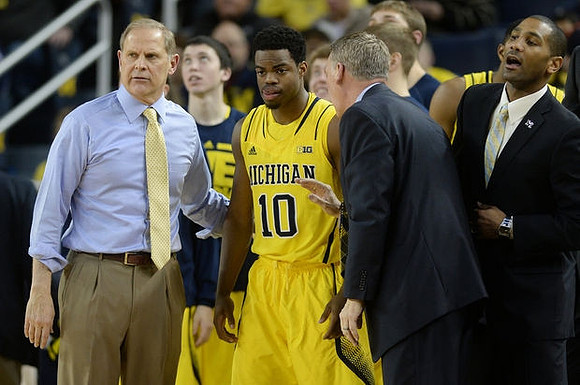 John Beilein, Derrick Walton Jr. (10), Jeff Meyer, and LaVall Jordan