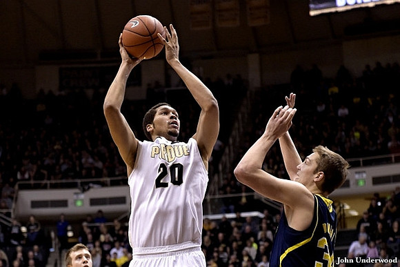 Spike Albrecht (2) and Mark Donnal (34)