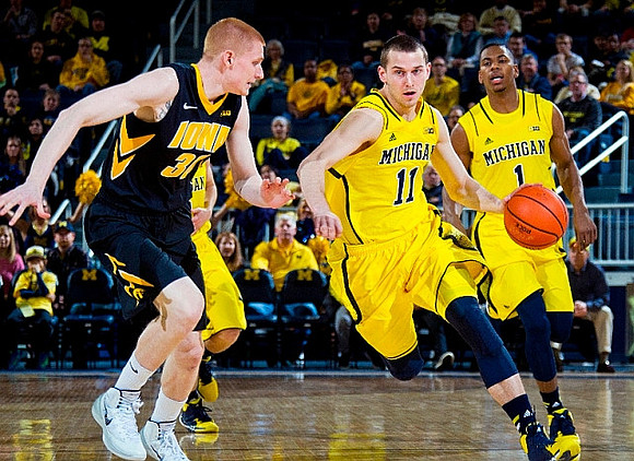 Nik Stauskas (11) and Glenn Robinson III (1)