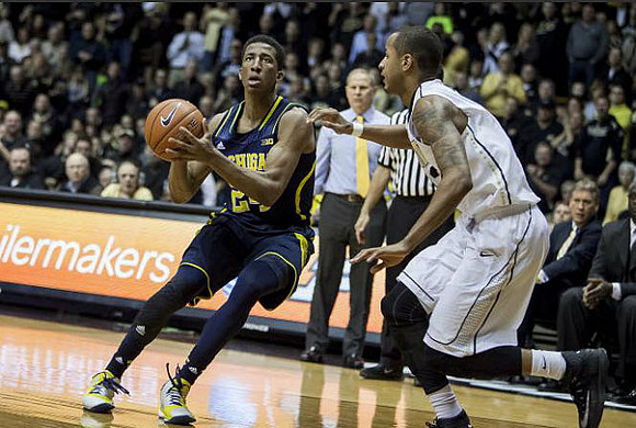 Aubrey Dawkins (24) and John Beilein