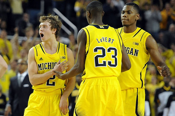 Spike Albrecht (2), Caris LeVert (23), and Glenn Robinson III (1)
