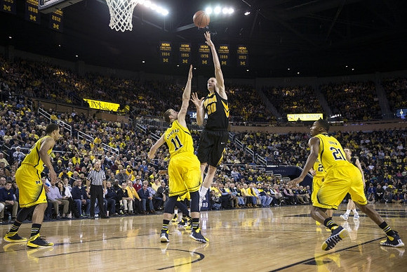Jordan Morgan (52), Nik Stauskas (11), and Zak Irvin (21)
