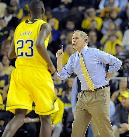 Caris LeVert (23) and John Beilein