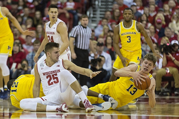 Muhammad-Ali Abdur-Rahkman (12), Moritz Wagner (13), and Xavier Simpson (3)