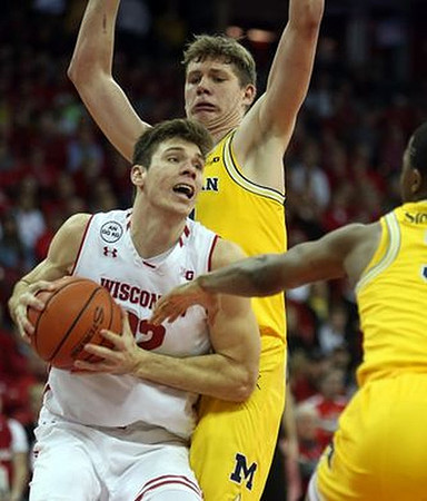 Moritz Wagner (13) and Xavier Simpson (3)