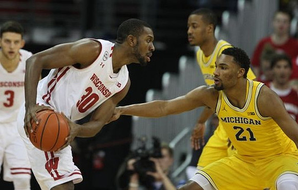 Muhammad-Ali Abdur-Rahkman (12) and Zak Irvin (21)