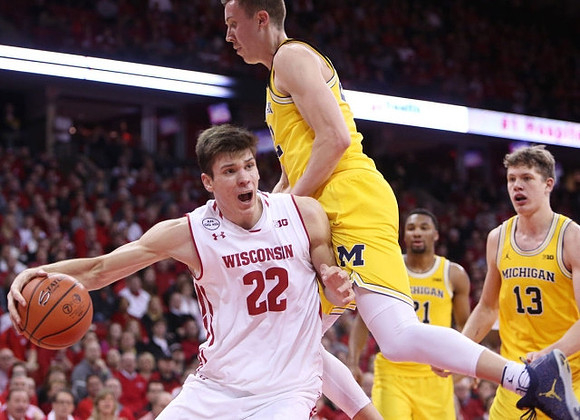 Duncan Robinson (22), Zak Irvin (21), and Moritz Wagner (13)