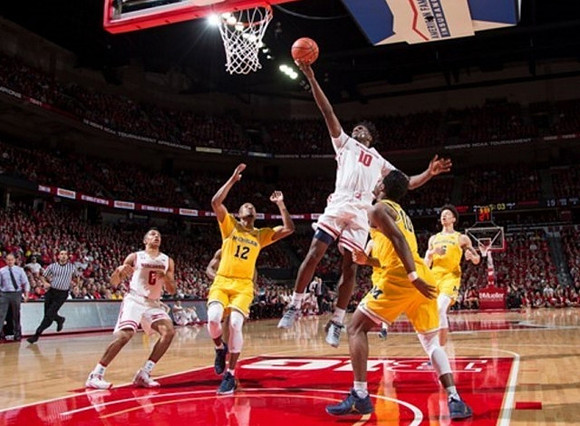 Muhammad-Ali Abdur-Rahkman (12), Derrick Walton Jr. (10), and D.J. Wilson (5)