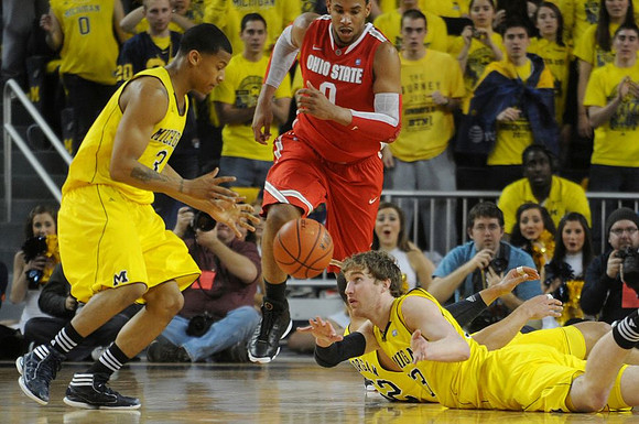 Trey Burke (3), Jordan Morgan (52), and Evan Smotrycz (23)
