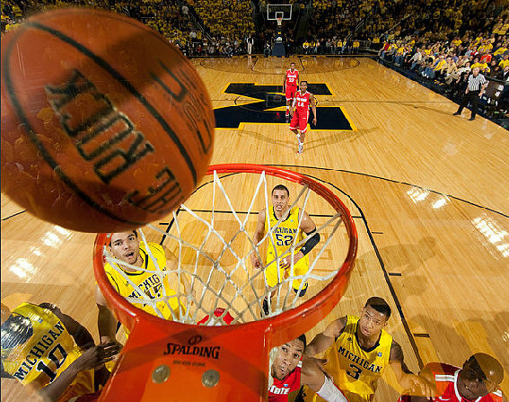 Tim Hardaway Jr. (10), Colton Christian (45), Jordan Morgan (52), and Trey Burke (3)