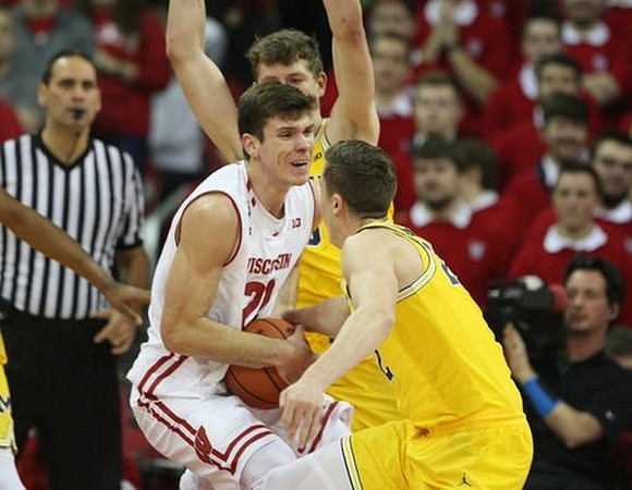 Moritz Wagner (13) and Duncan Robinson (22)