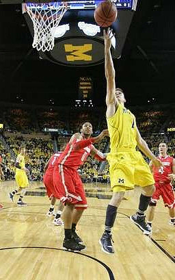 Evan Smotrycz (23) and Stu Douglass (1)