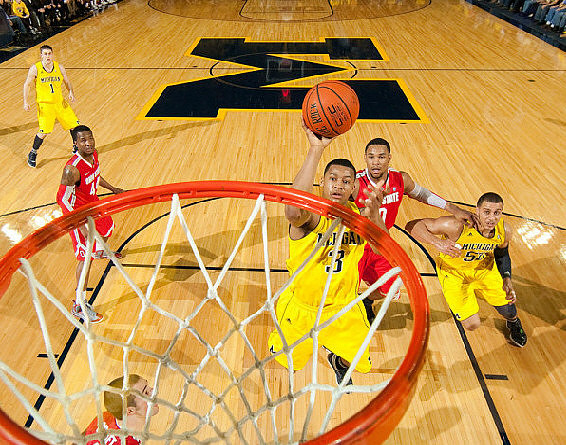 Stu Douglass (1), Trey Burke (3), and Jordan Morgan (52)