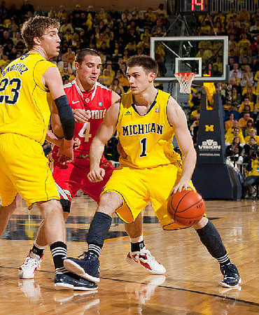 Evan Smotrycz (23) and Stu Douglass (1)
