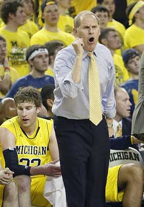 Evan Smotrycz (23) and John Beilein