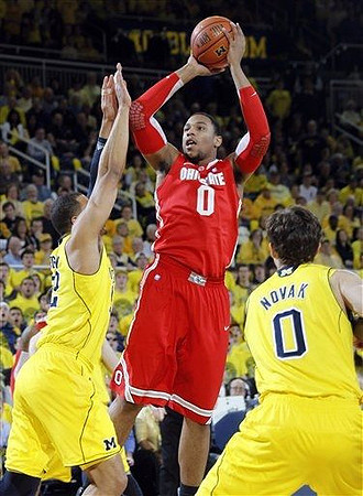 Jordan Morgan (52) and Zack Novak (0)