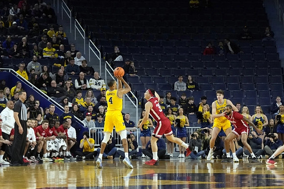 Nimari Burnett (4) and Will Tschetter (42)
