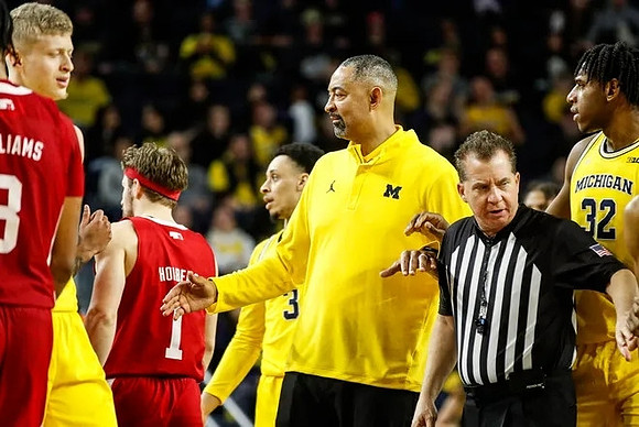 Youssef Khayat (24), Jaelin Llewellyn (3), Juwan Howard, and Tarris Reed Jr. (32)